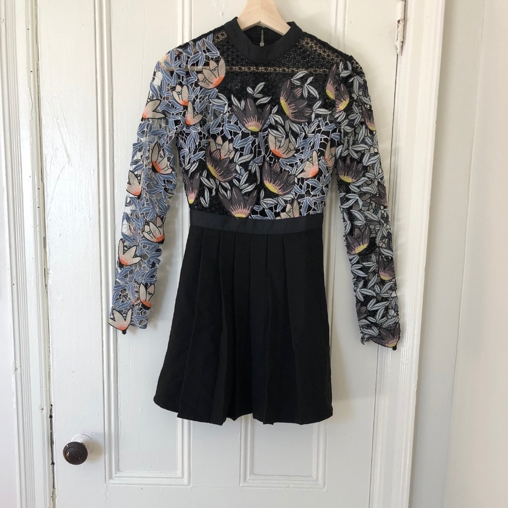 Beautiful laced dress with draped bottom